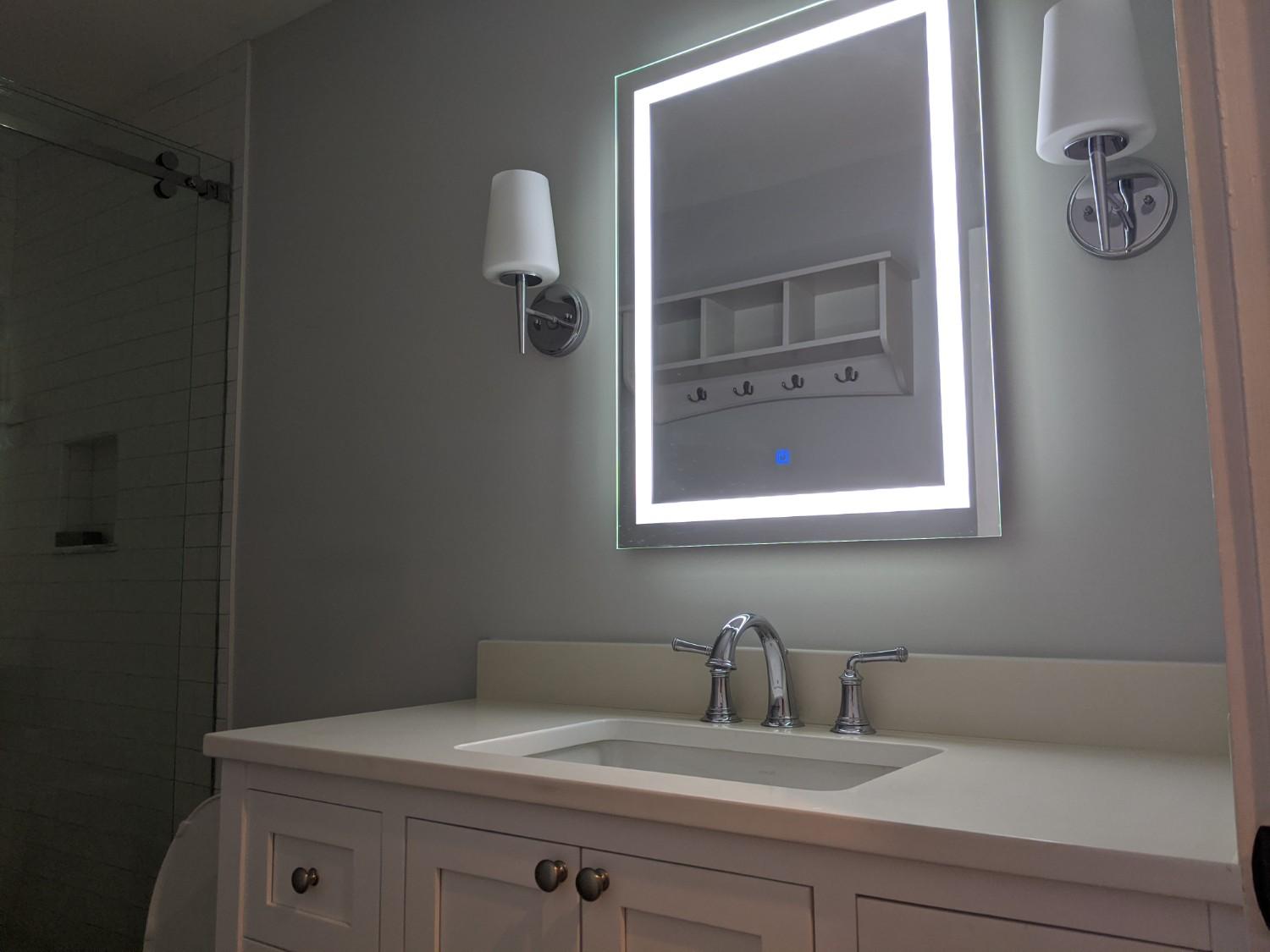 bathroom renovation – modern fixtures and tile work by LeBlanc Contracting