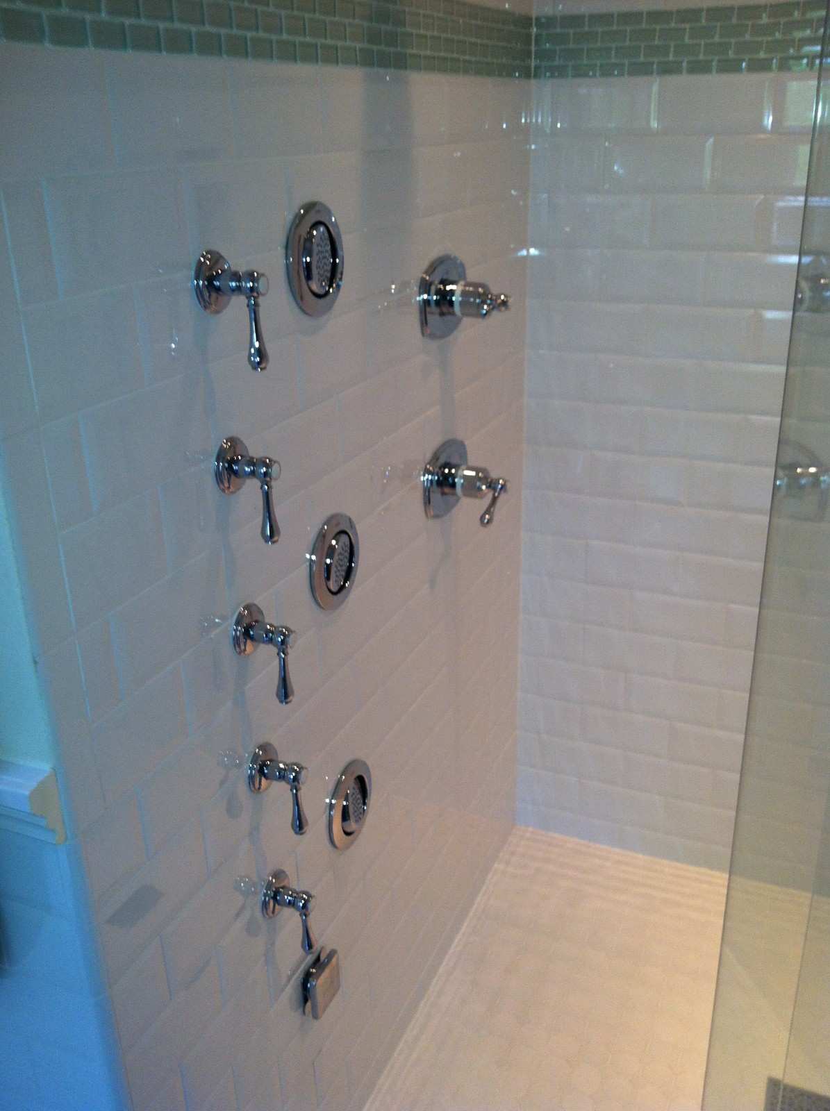 Bathroom remodel custom tile, vanity, and shower by LeBlanc Contracting