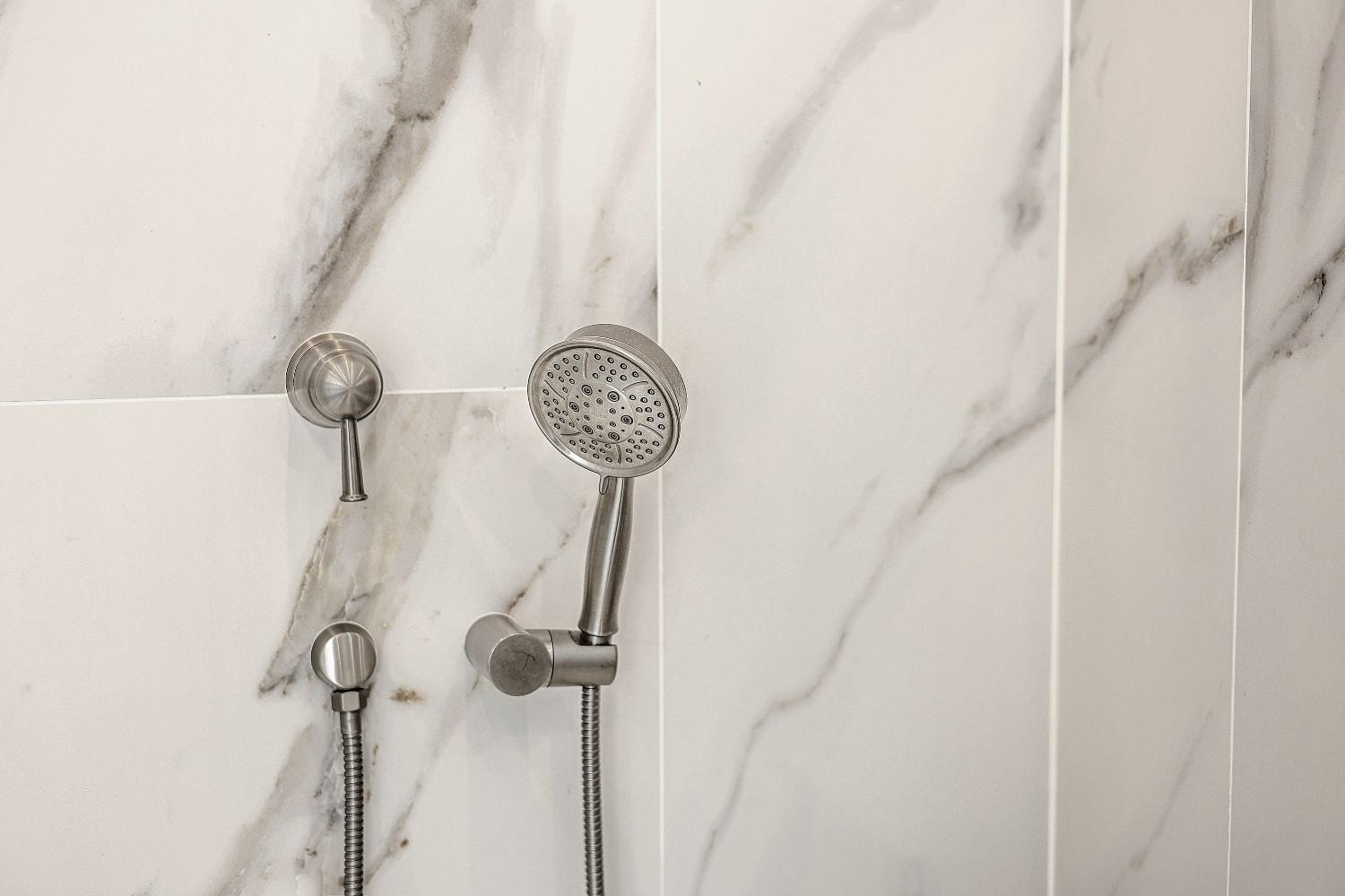 Bathroom remodel custom tile, vanity, and shower by LeBlanc Contracting