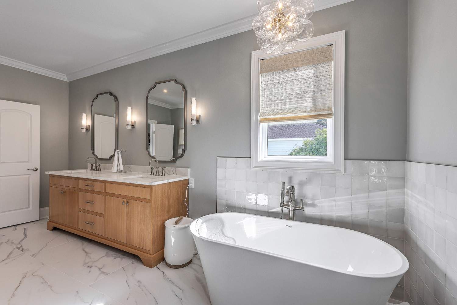 Bathroom remodel custom tile, vanity, and shower by LeBlanc Contracting