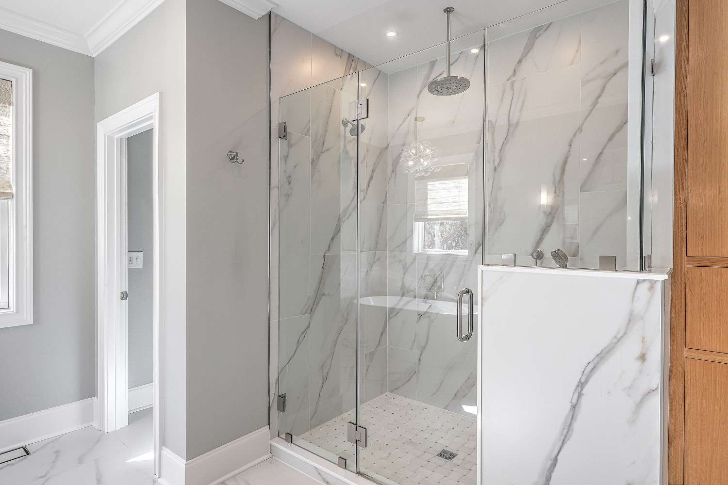 Bathroom remodel custom tile, vanity, and shower by LeBlanc Contracting